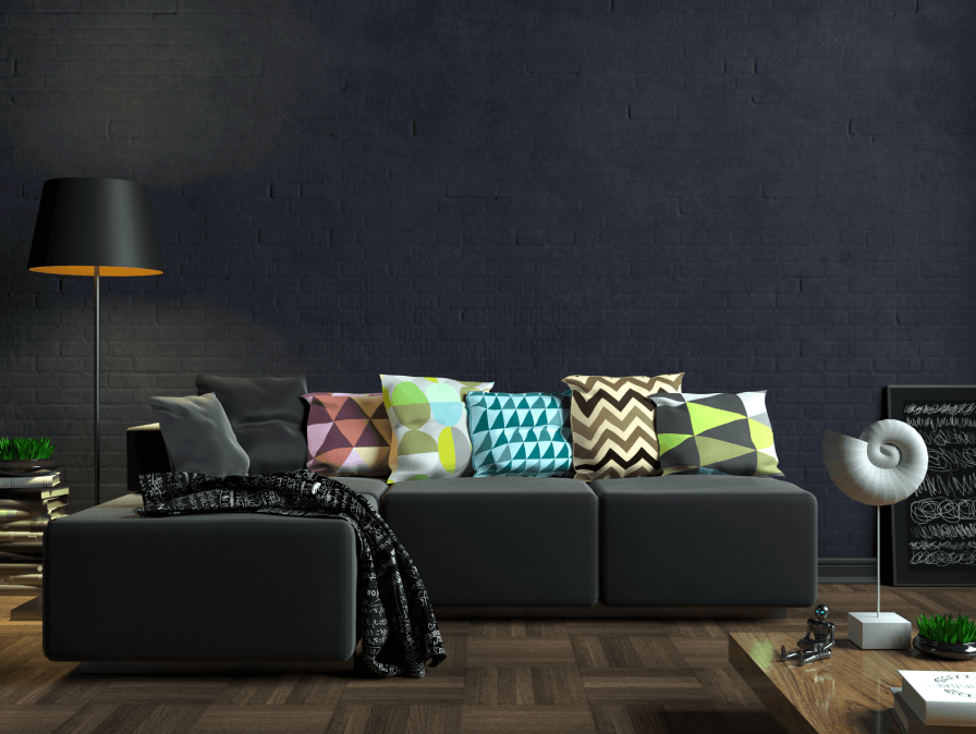 Charcoal Grey sofa, featuring various colored pillows.